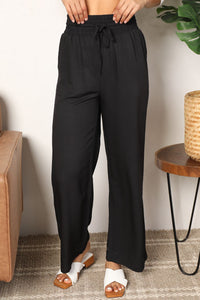 Double Take Drawstring Smocked Waist Wide Leg Pants  Krazy Heart Designs Boutique Black S 